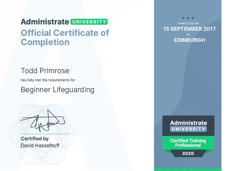 An old Administrate University certificate of completion in blue, gray, and green.