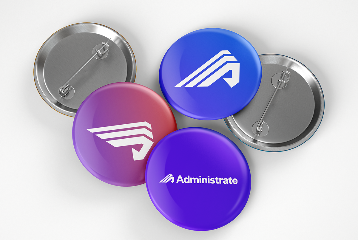 Logomark and full logo on mockup of buttons.